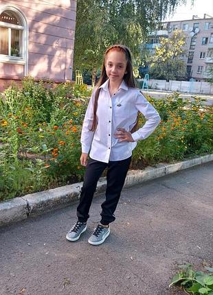 Блузка з полоскою по боках