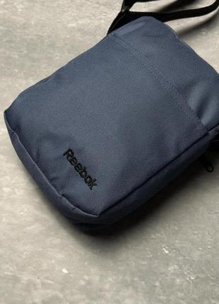 Барсетка reebok синя 600д чорне лого