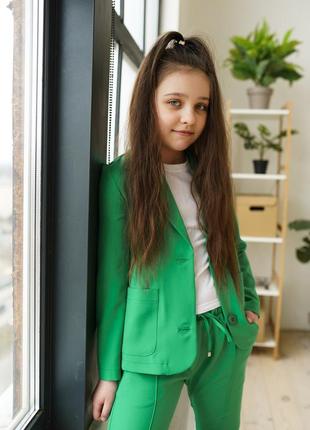 Дитячий літній брючний костюм в зеленому кольорі для дівчинки 158 см.