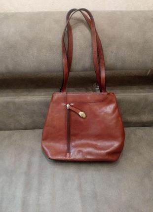 Рыжая стильная брендовая сумка рюкзак ashley jones---2в одном.. оригинал.кожа