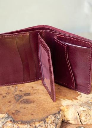 Кожаный кошелек на 10 отделов (имеет монетницу и прозрачный) с тиснением цветочный сад бордовый марсала4 фото