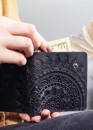 Кожаный кошелек на 10 отделов (имеет монетницу и прозрачный) с тиснением солнце черней6 фото