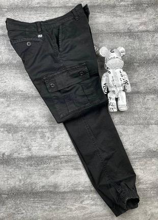 Карго брюки c.p company черные мужские3 фото
