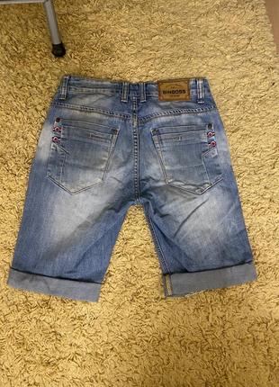 Рваные джинсовые шорты2 фото
