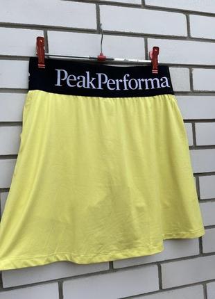 Спортивная желтая юбка с шортами для гольфа peak performance7 фото