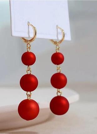 Елегантні вишукані сережки червоні кулі сережки стильні вечірні висячі довгі1 фото