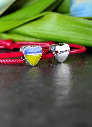 Шкіряний браслет червоний зі срібною намистиною моя україна. регульований браслет із патріотичним шармом.