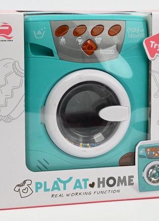 Игрушка стиральная машинка с крутящимся барабаном световые и звуковые эффекты наляля8 фото