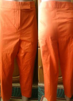 Легкі оранжеві брюки р40/42