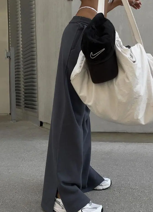 Женские трендовые спортивные брюки-палаццо с разрезами 4 цвета 145ко5 фото