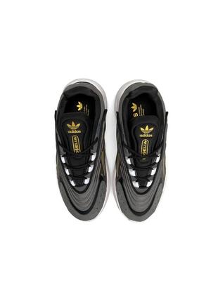 Жіночі кросівки adidas ozelia dark grey gold3 фото