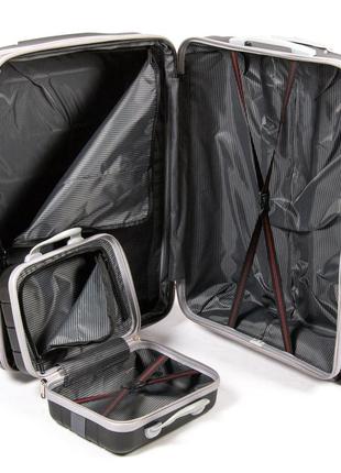 Набір пластикових валіз + косметичка 4 шт abs-пластик fashion 811 black8 фото