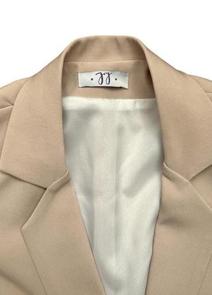 Легкий бежевий подовжений піджак на кнопках з ременем, розмір s3 фото