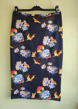 Трикотажная юбка женственного фасона яркой расцветки с оригинальным принтом бренда atmosphere1 фото