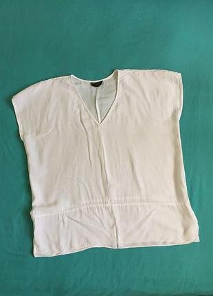 Біла обьємна блуза