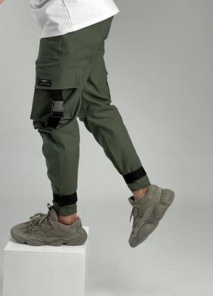 Мужские зелёные хаки штаны брюки карго на утяжках джогеры зелені джогери карго на манжеті6 фото