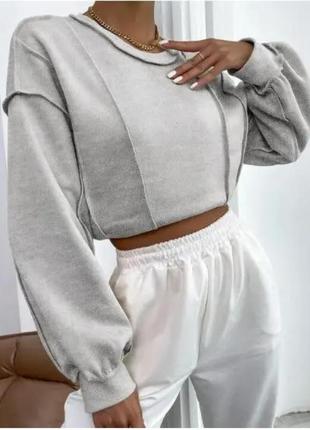 Жіночий ангоровий светр із екстравагантними зовнішніми швами та стильними спущеними плечима (бежевий, сірий)4 фото