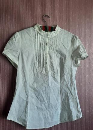 Прекрасна блуза з воротом стійкою і манішкою від roseland