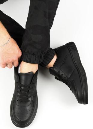 Черные кроссовки из экокожи1 фото