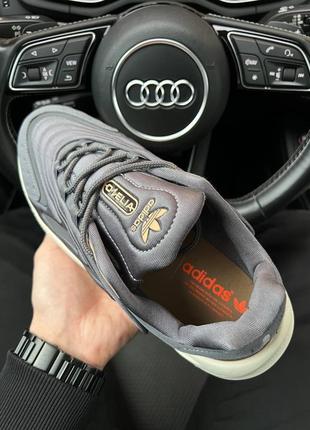 Чоловічі кросівки adidas ozelia originals gray gold4 фото