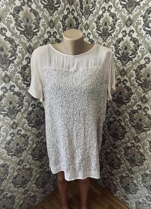 Футболка в паєтках