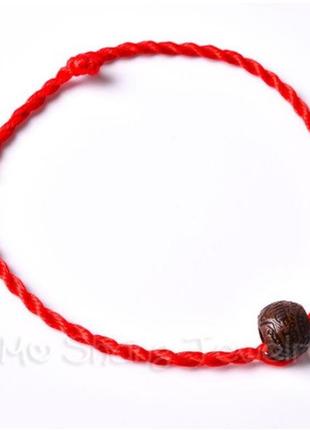 Червоний браслет-нитка з бусинкою