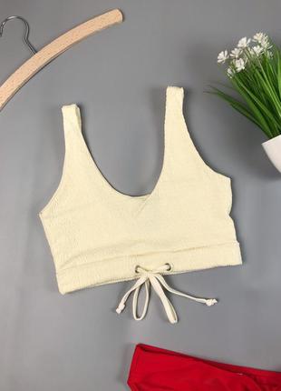 Ніжно жовтий топ зі шнурочком plt, фактурний жатка
