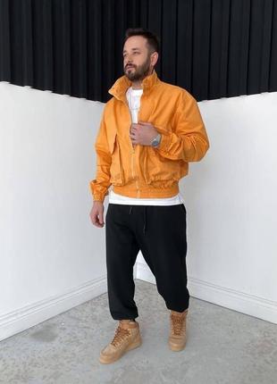 Качественная мужская джинсовка оранжевая на осень - весну / повседневные джинсовые куртки для мужчин4 фото