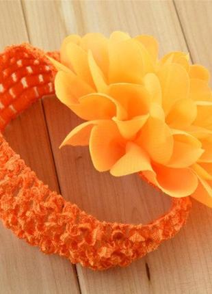 Детская оранжевая повязка на голову - окружность головы приблизительно 26-50см, диаметр цветка 10см2 фото