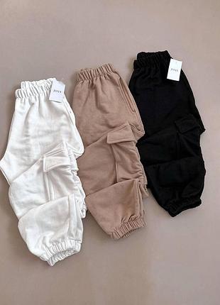 Жіночі модні штани-карго з кишенями