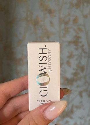 Тональний тінт від huda beauty glowish у відтінку 07 tan light1 фото