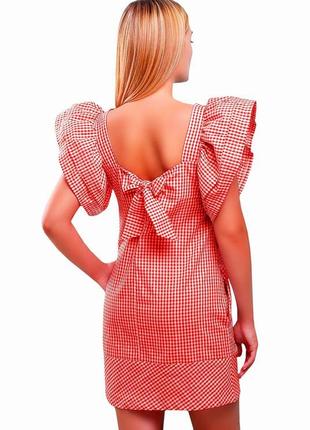 Стильне плаття в клітку з об'ємними рукавами-рюшами і бантом на спині1 фото
