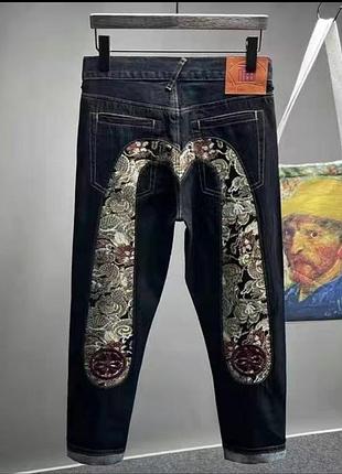 Джинсы evisu