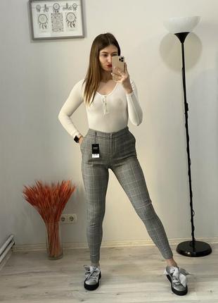 Штани в клітку next