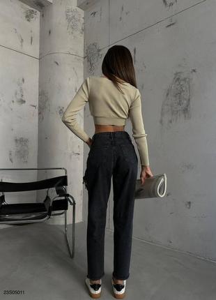 Трендовые рваные джинсы с высокой посадкой разрезами прямого свободного кроя модные мом6 фото