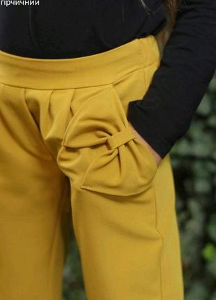 Штани га дівчинку