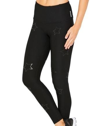 Відмінні лосинны легінси тайтсы спортивні тренінг rbx leggings with black stars silicon