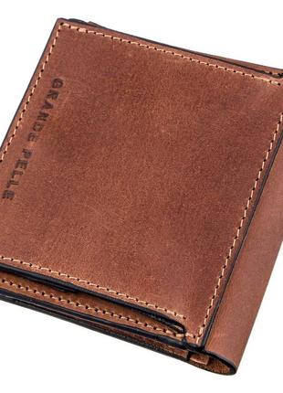 Компактное портмоне унисекс с накладной монетницей grande pelle 11238 коричневое2 фото