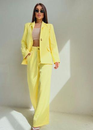 Костюм жіночий класичний однотонний оверсайз піджак з плічиками на гудзику штани вільного крою на високій посадці якісний базовий жовтий пудровий