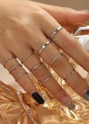 Набір із золотих тонких каблучок (10 шт) (iss)