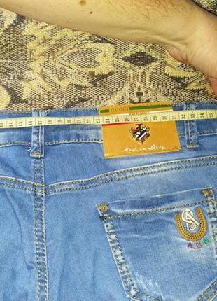 Рваные джинсовые шорты8 фото