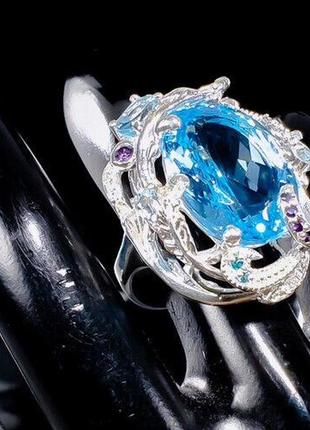 Серебряное кольцо с голубым топазом (натуральные), серебро 925 пр. размер 17,53 фото