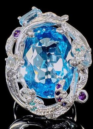 Серебряное кольцо с голубым топазом (натуральные), серебро 925 пр. размер 17,51 фото