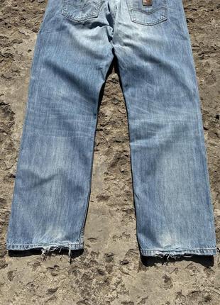 Винтажные потертые джинсы carhartt texas5 фото