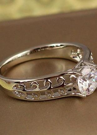 Кільце xuping jewelry ліана з білим каменем р 20 сріблясте