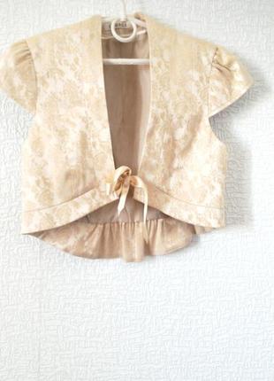 Модная в этом сезоне жилетка для девушки george цвета беж