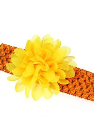 Детская оранжевая повязка на голову - окружность головы приблизительно 26-50см, диаметр цветка 10см