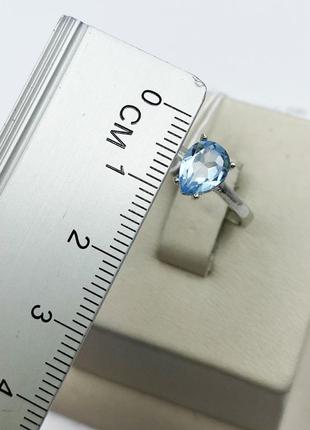 Каблучка срібна з блакитним топазом 18 1,65 г6 фото