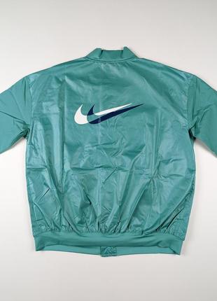 Женская ветровка nike оригинал4 фото