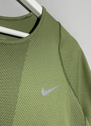 Спортивная футболка nike с рефлективными логотипом2 фото